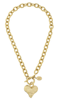 Gold chain necklace with a heart-shaped pendant on a white background