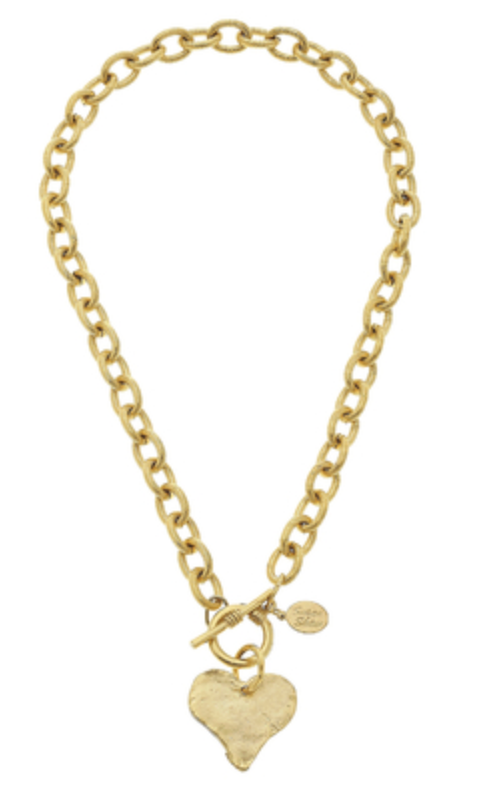 Gold chain necklace with a heart-shaped pendant on a white background