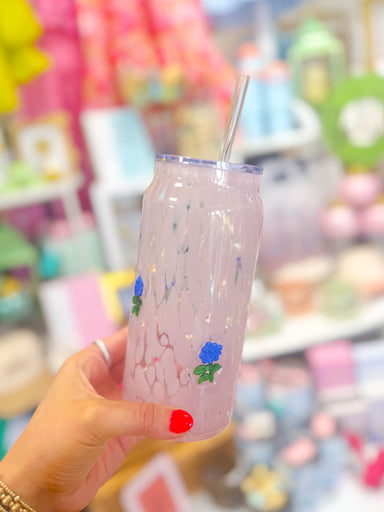 Glass cup with blue hydrangeas on it by swig