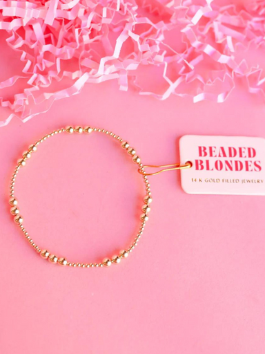 A gold-filled beaded bracelet with mixed 2mm & 4mm beads