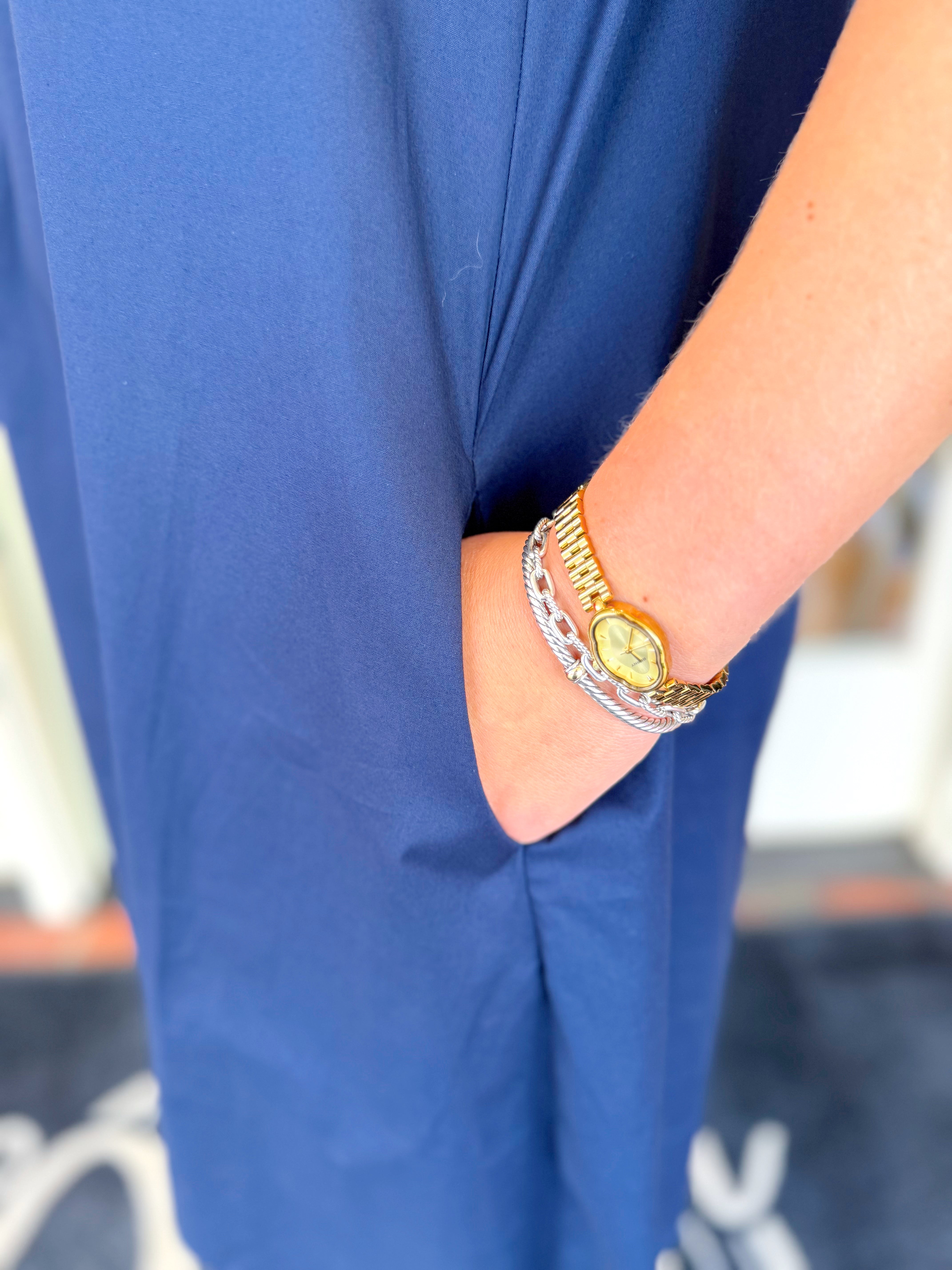 The Gracie Ruffle Tie Neck Dress in Navy