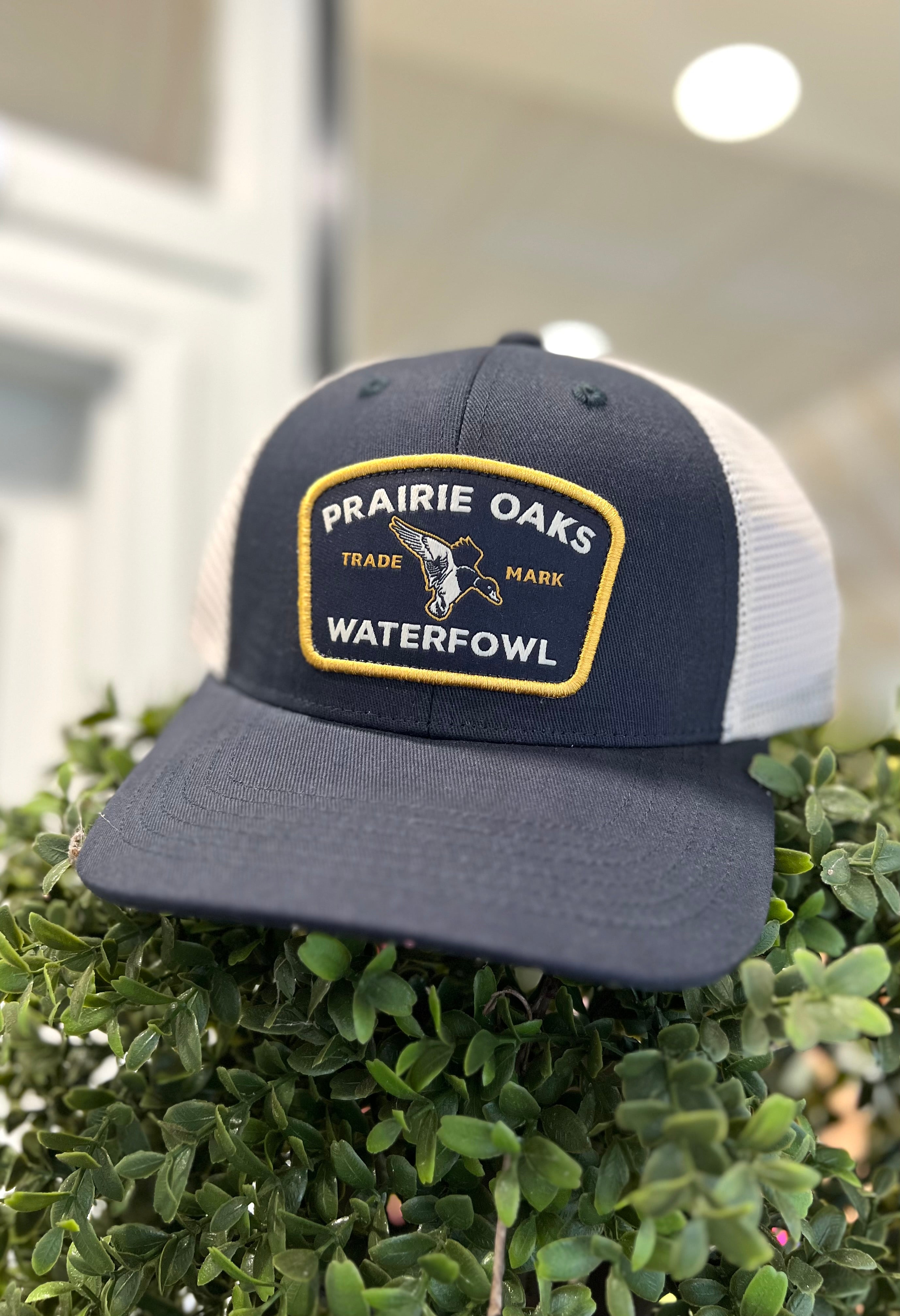 Trademark Patch Trucker Hat in Navy by Prairie Oaks Waterfowl