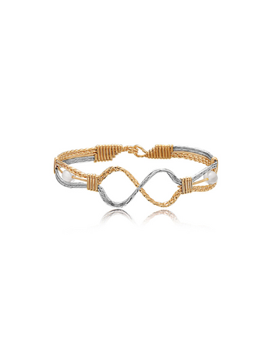 Gold and silver bracelet on a white background