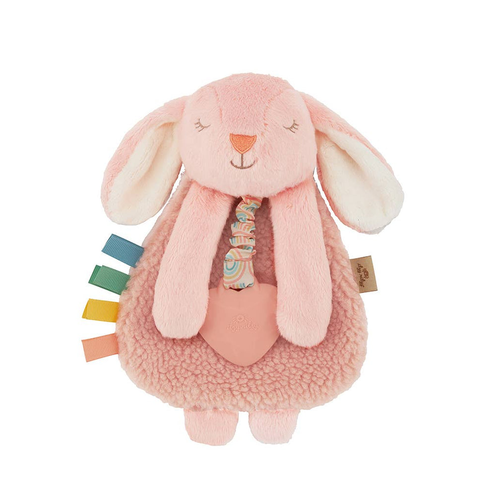 Pink plush toy with colorful tabs on a white background