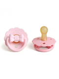 Set of two pink pacis with a natural ribber end by itzy ritzy