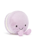 Purple plush toy with a smiling face on a white background