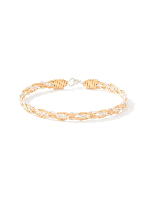 Gold braided bracelet on a white background