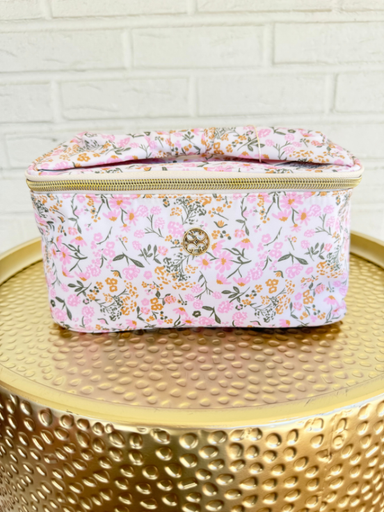Pink floral makeup zip bag with bow handle