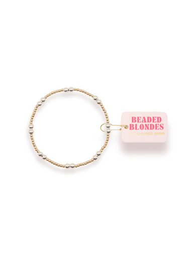 A gold filled beaded bracelet with gold and silver beads