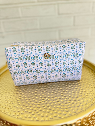Blue and green patterned cosmetic zip bag