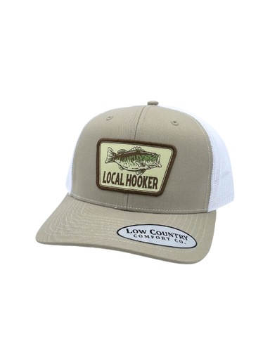tan hat with a patch that says local hooker with a fish on it 