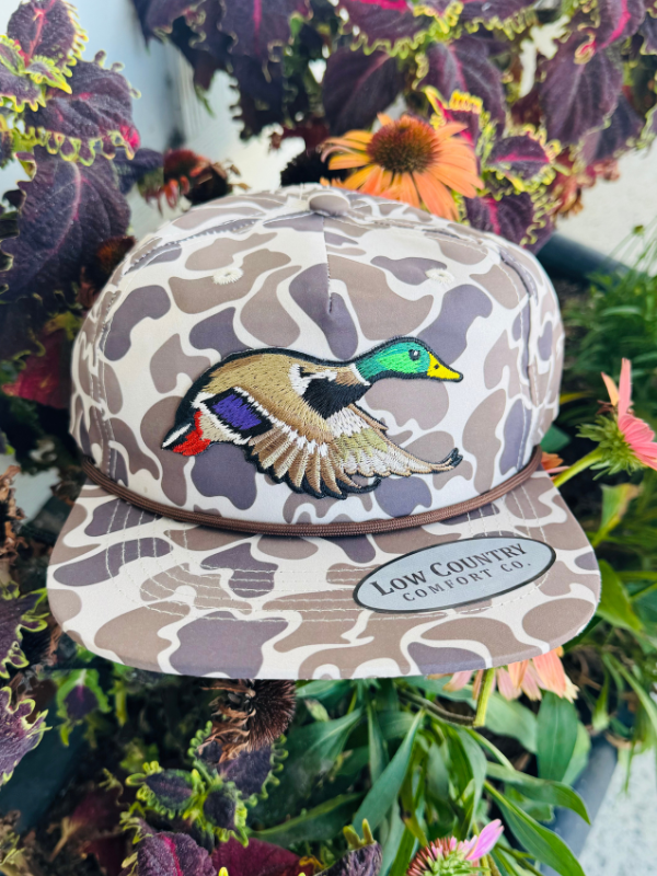 duck on a brown camo hat 