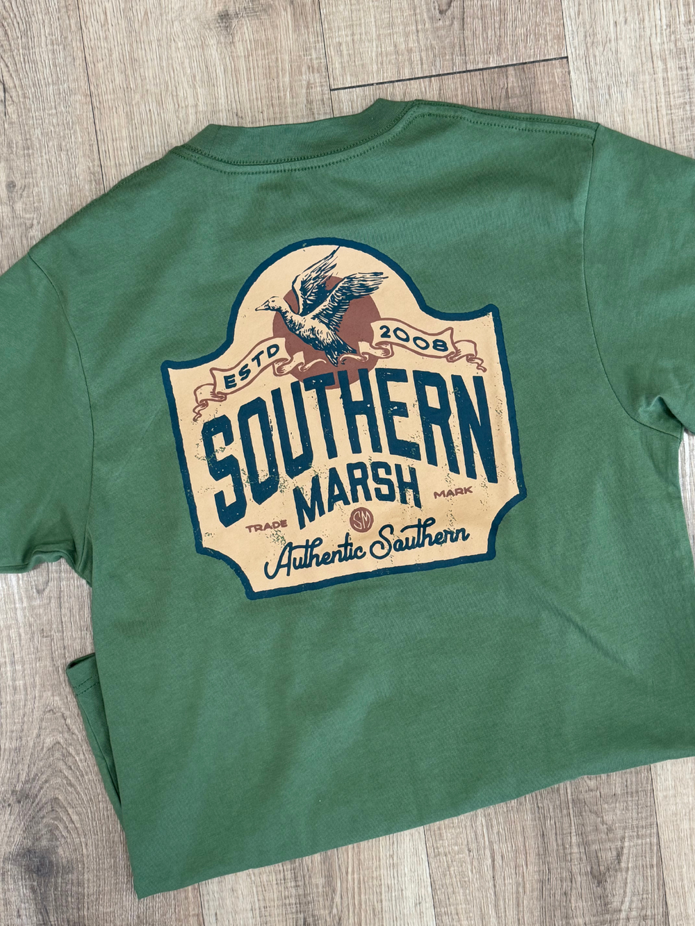 vintage duck on a green tee