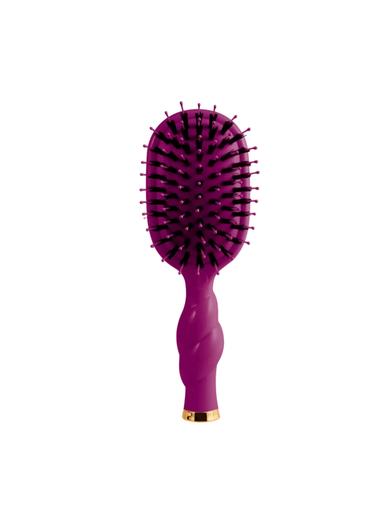 A purple oval hairbrush with black bristles and a gold accent at the base