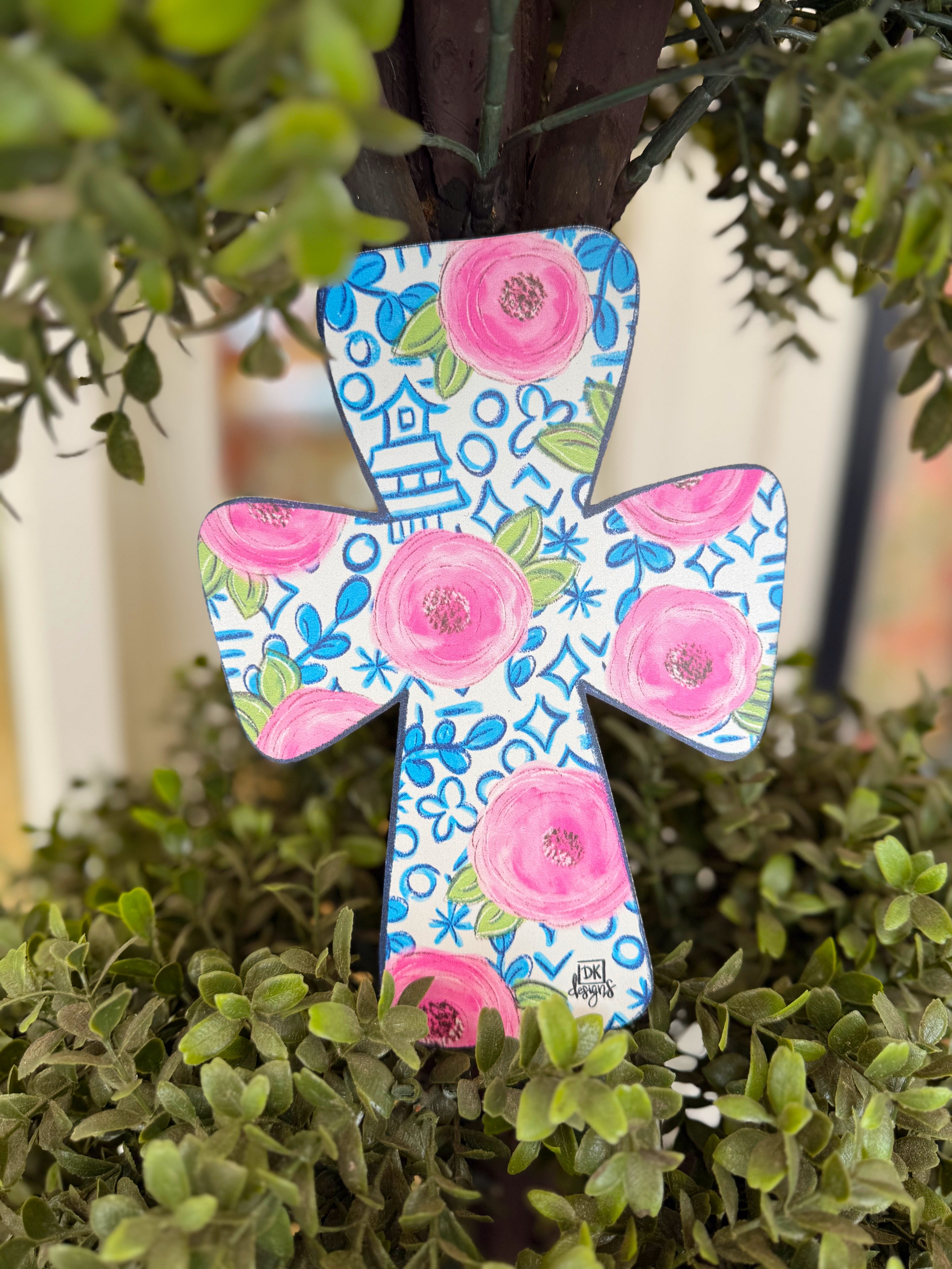 A decorative cross velcro attachment for DK designs door hanger