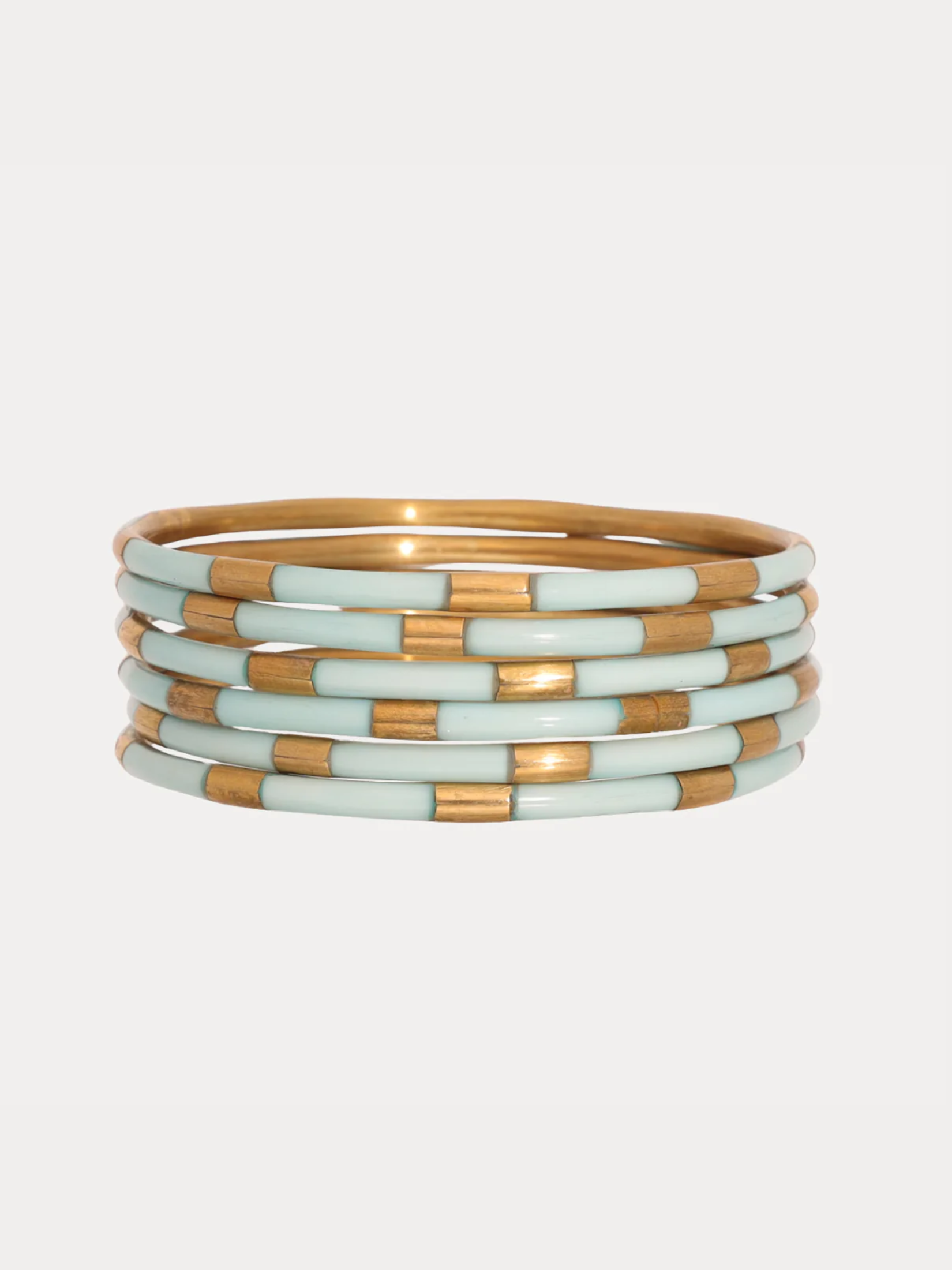 Mint Enamel Veda Bracelets set of six stacked together in soft mint green.