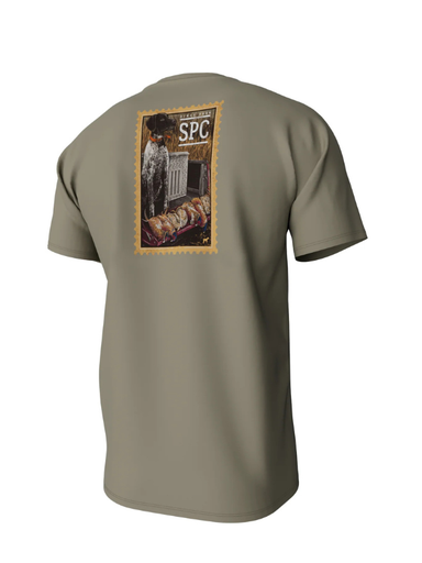 stamp design with a dog and bird on a pocket tee