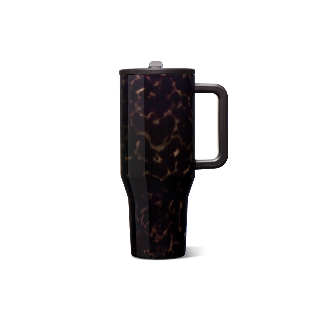 Tortoise shell tumbler with a handle and straw