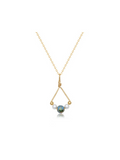 Gold wire necklace with a pendant that has a bead of the world and pearls. Made in the USA. A timeless piece that can be worn for years to come
