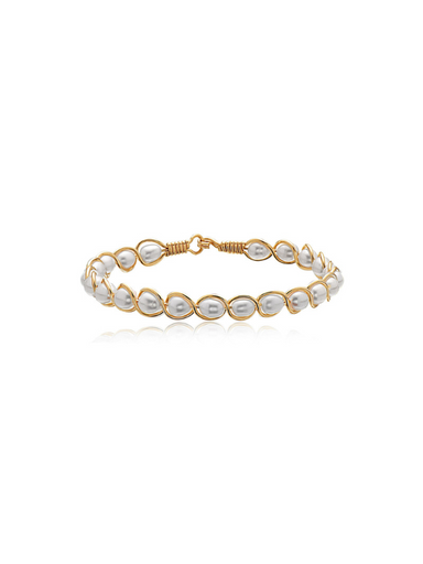 Gold bracelet with pearls on a white background