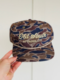 classic camo hat with cream color Old south in script on front 