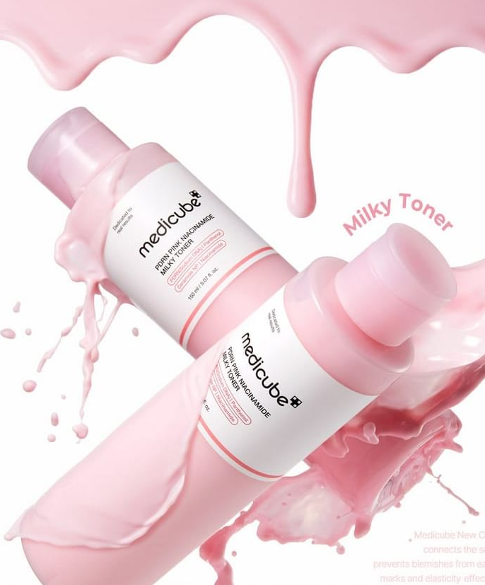 Two bottles of Medicube Milky Toner with pink and white design on a pink background.