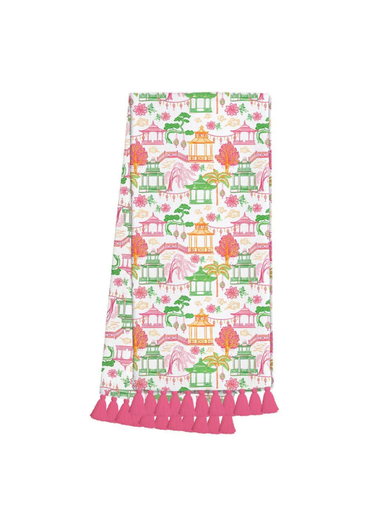 Decorative towel with colorful pagoda pattern and pink trim on a white background