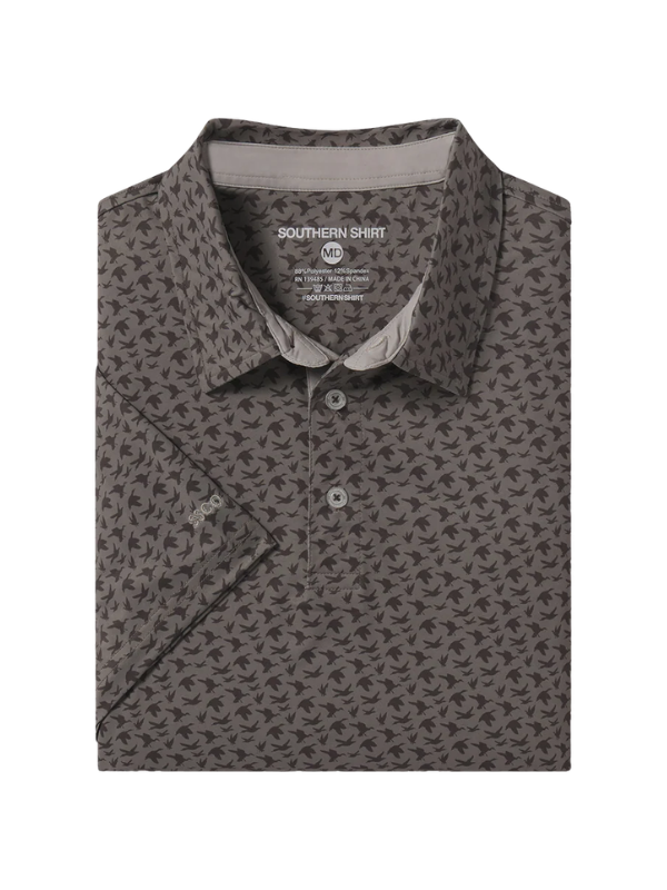 brown polo with ducks in flight printed all over