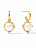 Gold earrings with white gemstones on a white background