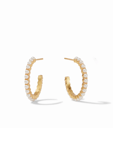 Gold hoop earrings with pearl accents on a white background
