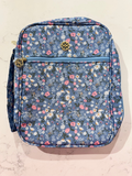 blue bible cover and pink flowers 