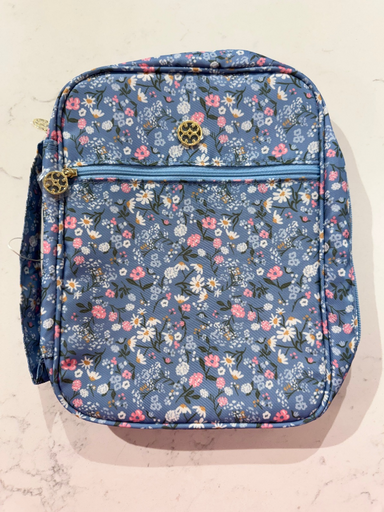 blue bible cover and pink flowers 