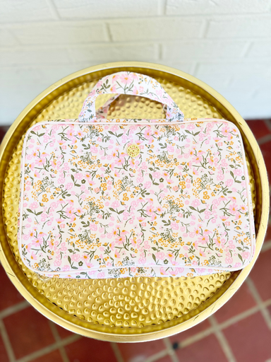 Pink and yellow floral toiletry bag with handles