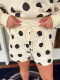 Black polka dot shorts with a drawstring 
