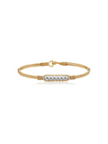 Gold bracelet with pearl beads on a white background