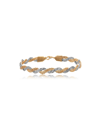 Two-tone gold and silver braided bracelet on a white background