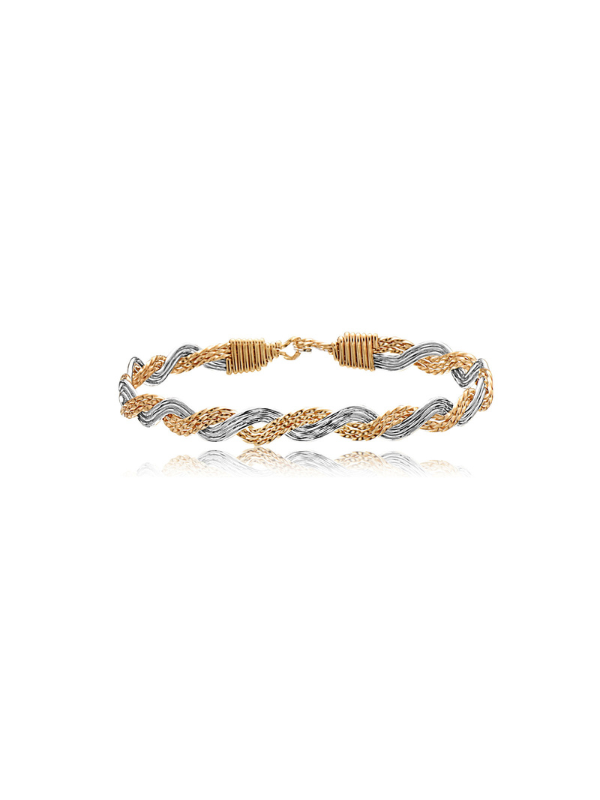 Two-tone gold and silver braided bracelet on a white background