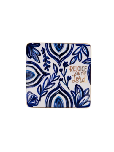 Decorative trinkey tray with blue floral pattern and 'Rejoice in the Lord' text on a white background