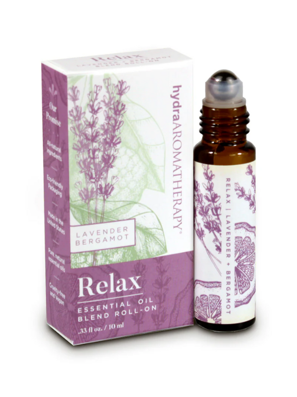 Essential oil blend roll-on with packaging on a white background