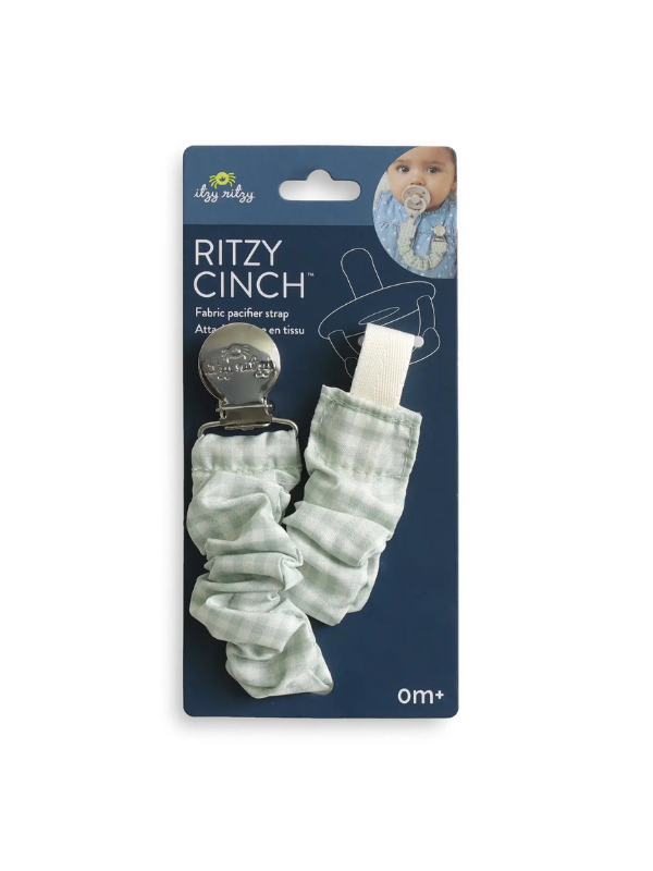 The Ritzy Cinch pacifier strap is thoughtfully tailored to gently attach to baby’s clothing while keeping pacifiers easily in view and always accessible. 
