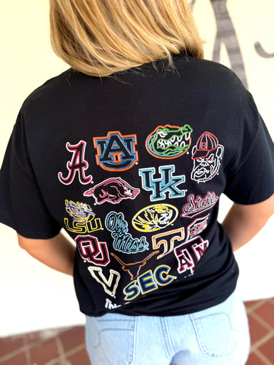A black graphic T-shirt with multiple colorful athletic logos in the SEC