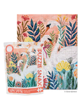 A jigsaw puzzle and its packaging shown on a white background. The puzzle features a colorful botanical design with pink, blue, yellow, and green floral elements, and the package reads 'PUZZLE SNAX' and 'WIKISAPP'.