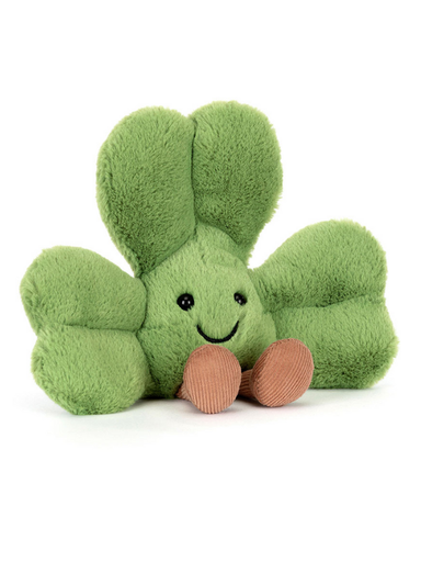 Green Jellycat plush with a happy face on a white background