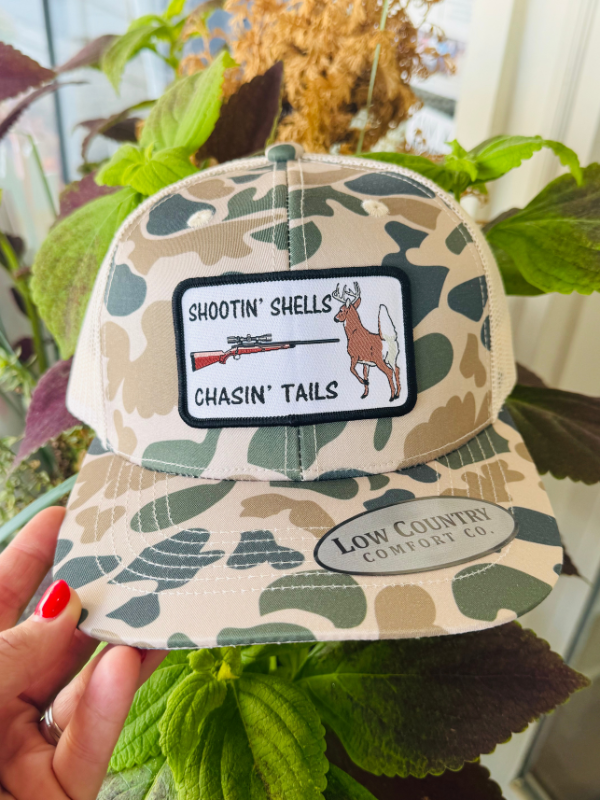 shootin deer and chasin tail patch on camo hat