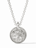Silver necklace with a detailed pendant on a white background