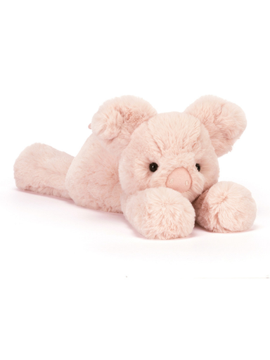 Pink pig jellycat on a white background