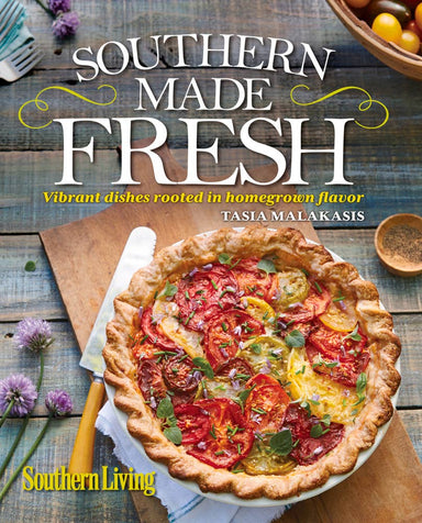 Cookbook cover of 'Southern Made Fresh' with a pie and kitchen utensils on a wooden surface.