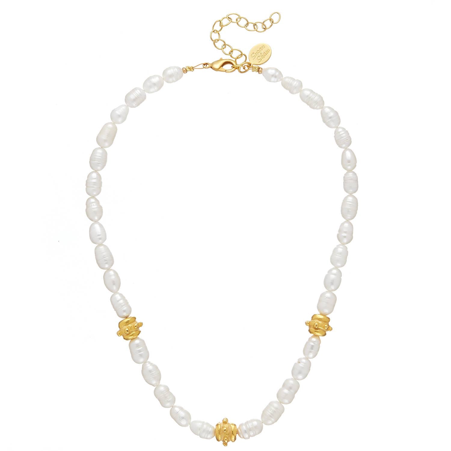 Pearl necklace with gold accents on a white background