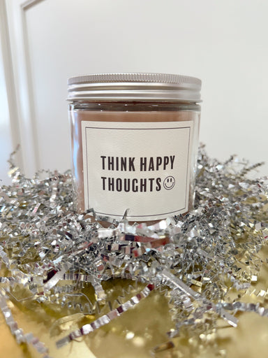 Sweet Grace candle with think happy thoughts on the jar of it 