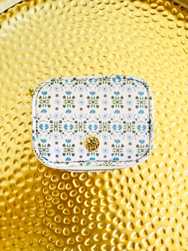 blue and green patterned zip pill organizer